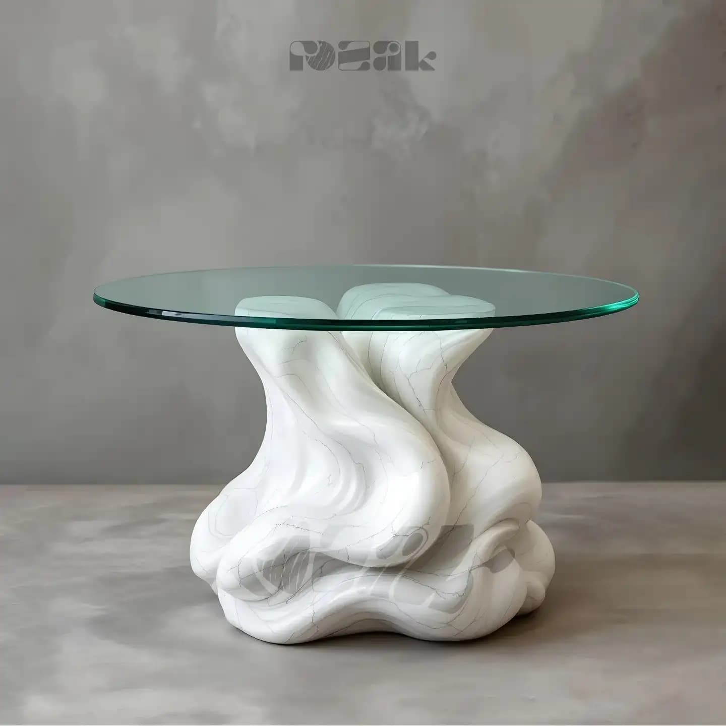 A round glass dining table on a flowing, cloud-like white marble base