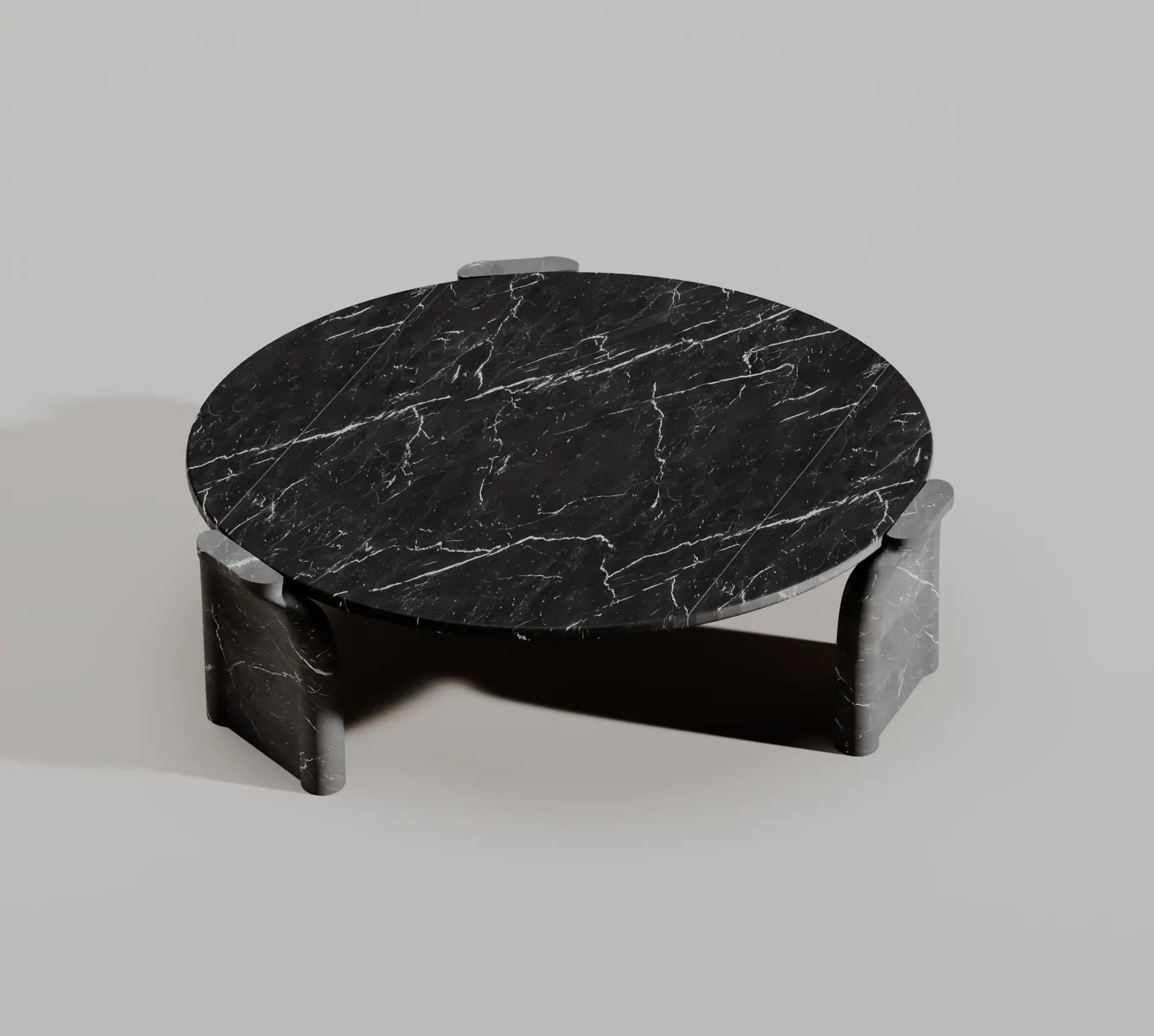 Top view of the Glade coffee table showing white veining in black marble