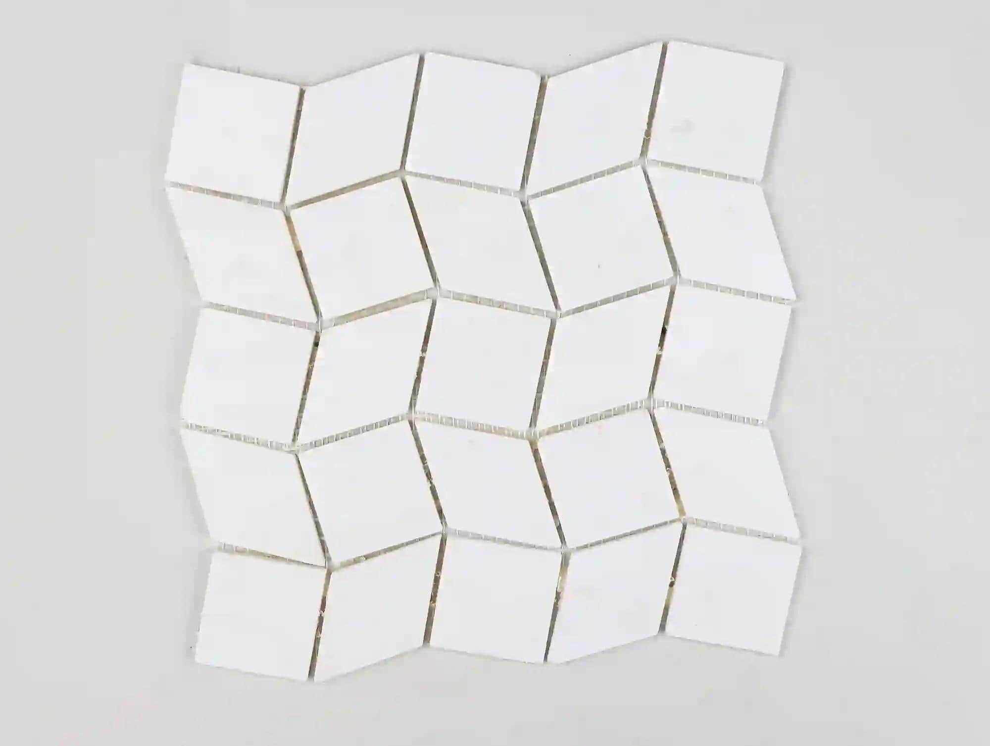 Pra Lá, e Pra Cá floor tile in greek white thassos marble