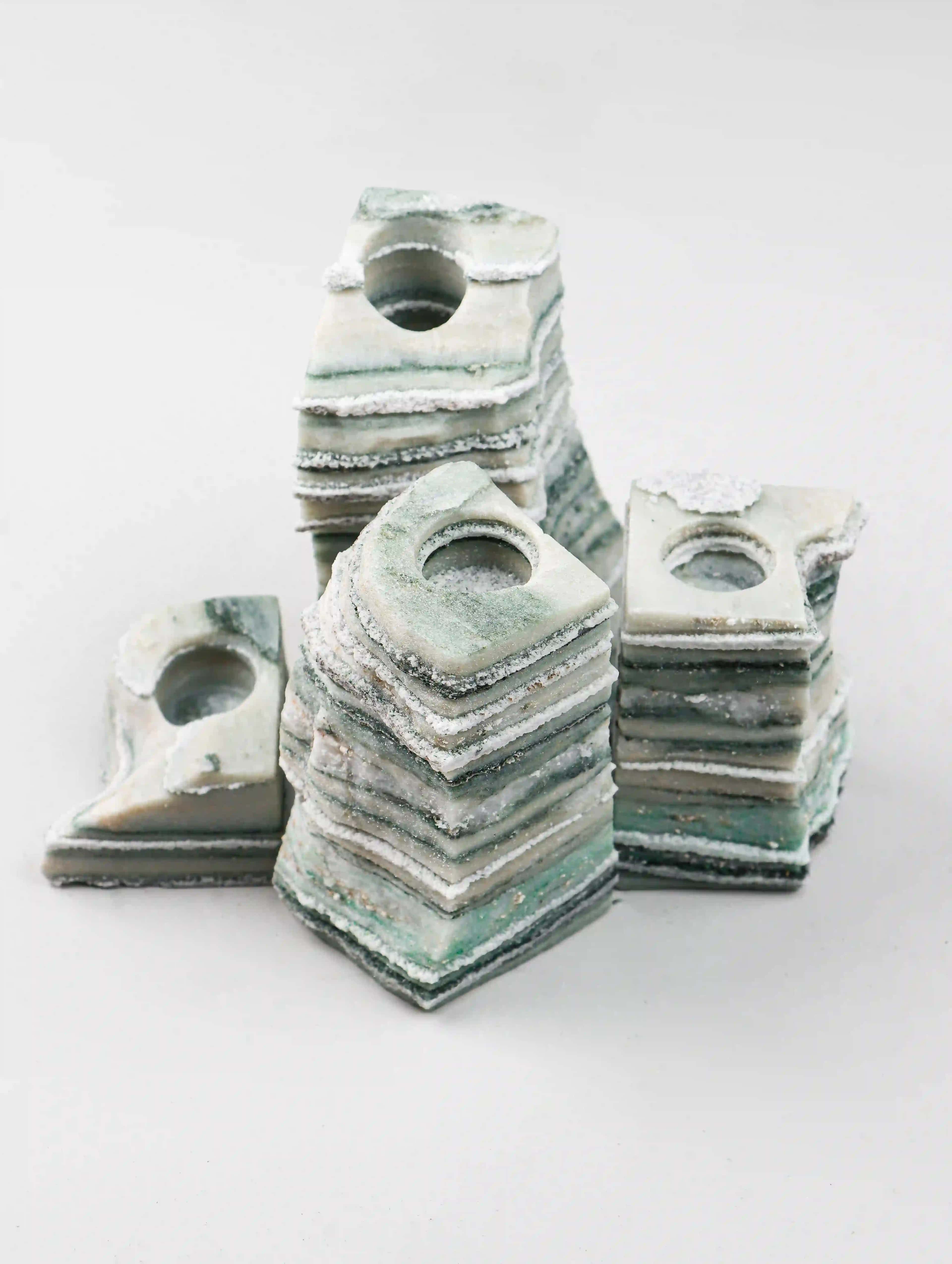 Profound hand-carved Portuguese green marble candle holder set