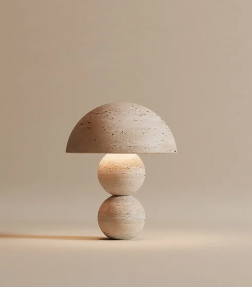 Volta lamp in Travertino marble — warm honeyed finish